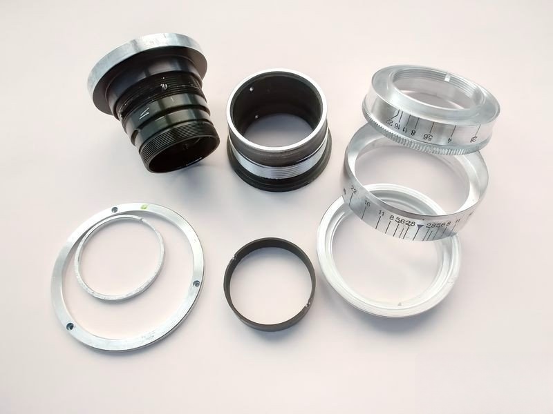 Cleaned lens parts after overnight soaking in naphtha