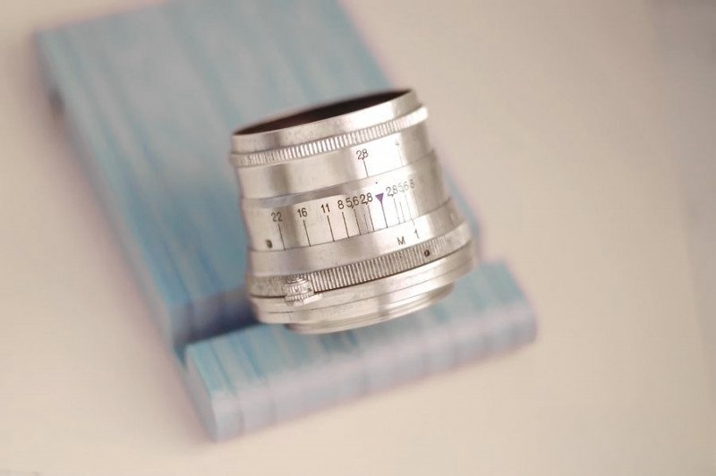 Restored Industar-26m lens side view with focusing tab