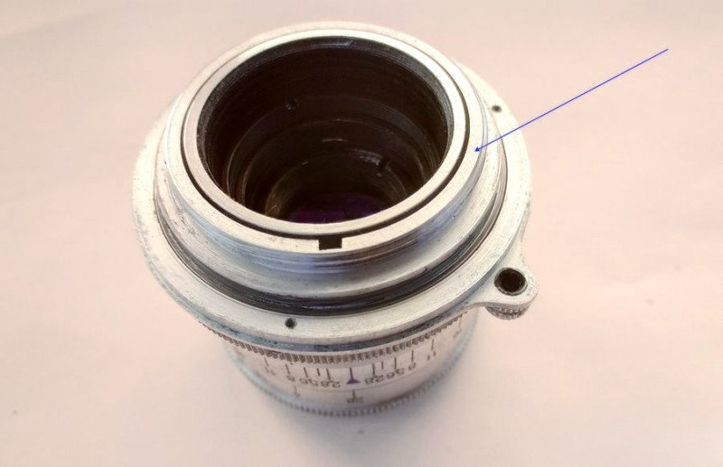 Removing rangefinder coupling cam from lens