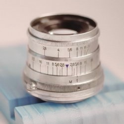 Industar-26m FED lens front view showing aperture ring and focusing tab