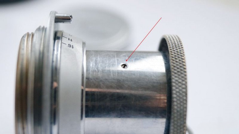 Installing retention screw to lock optical block