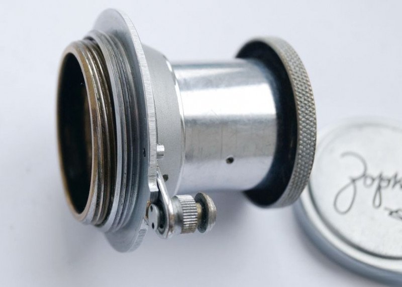 Collapsible lens locking mechanism detail