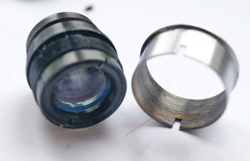Applying fresh lubricant to aperture ring threads
