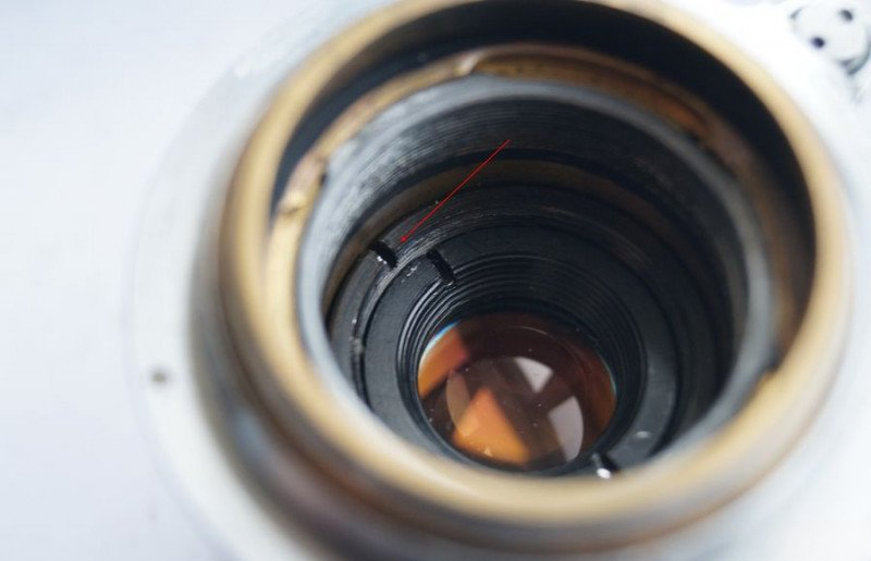 Securing optical block with retaining ring