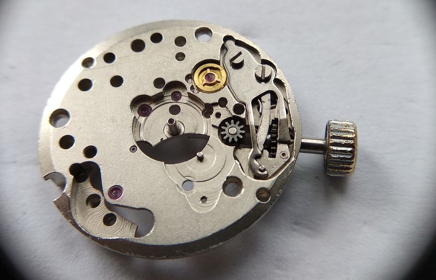 Keyless cover plate fitted over the reassembled keyless works of the Luch 1809