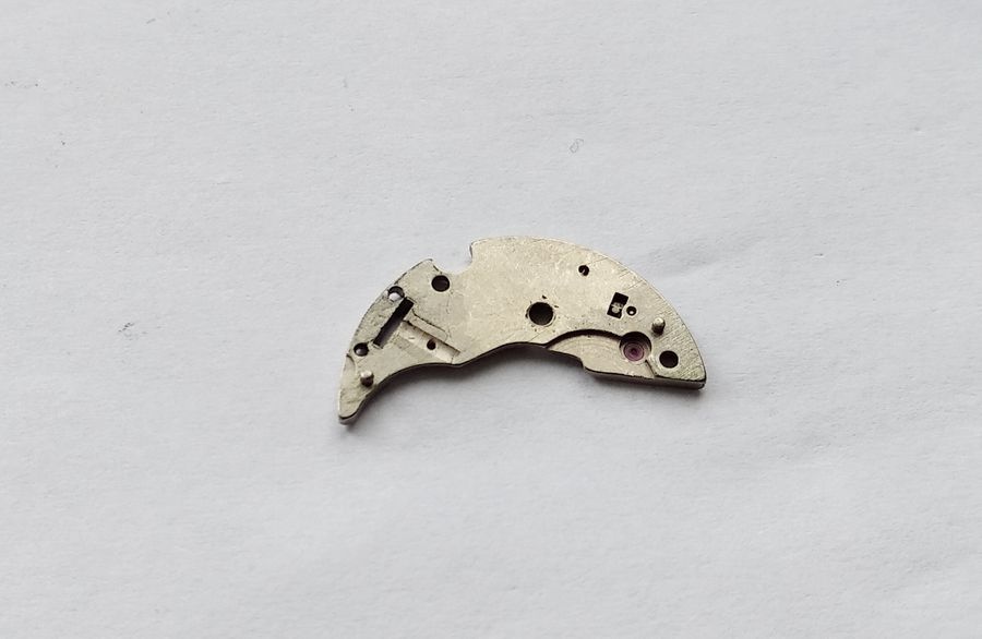 Underside of the Luch 1809 barrel bridge showing its pivot holes and steady pins