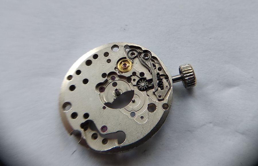 Setting lever, yoke, and clutch refitted on the dial side of the Luch 1809