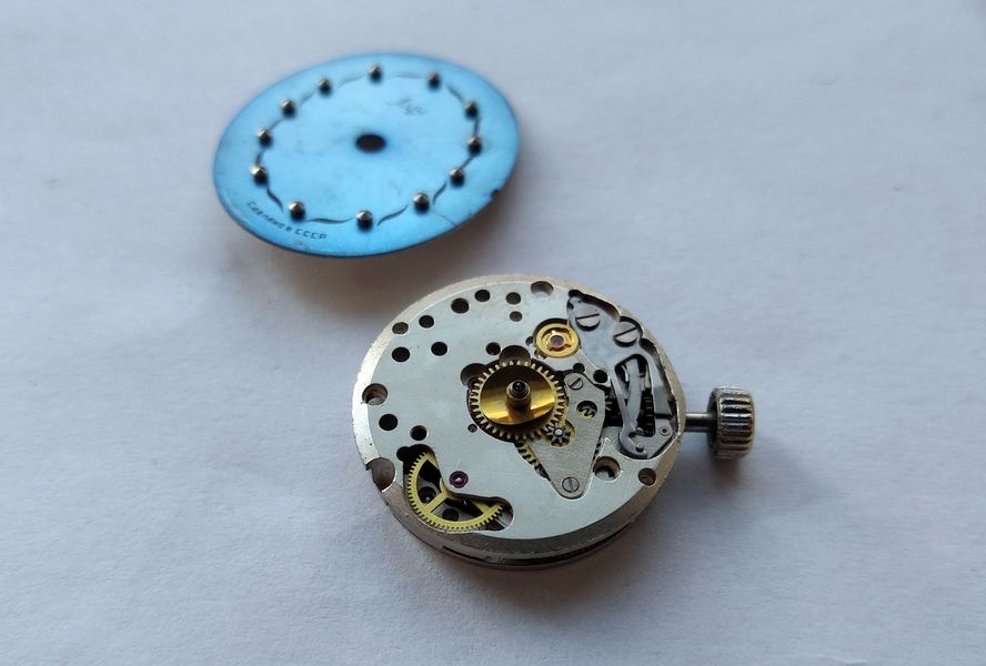 Dial lifted off the Luch 1809, showing the motion works underneath