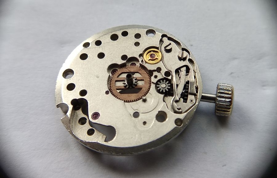 Cannon pinion with its copper spring wheel refitted to the Luch 1809