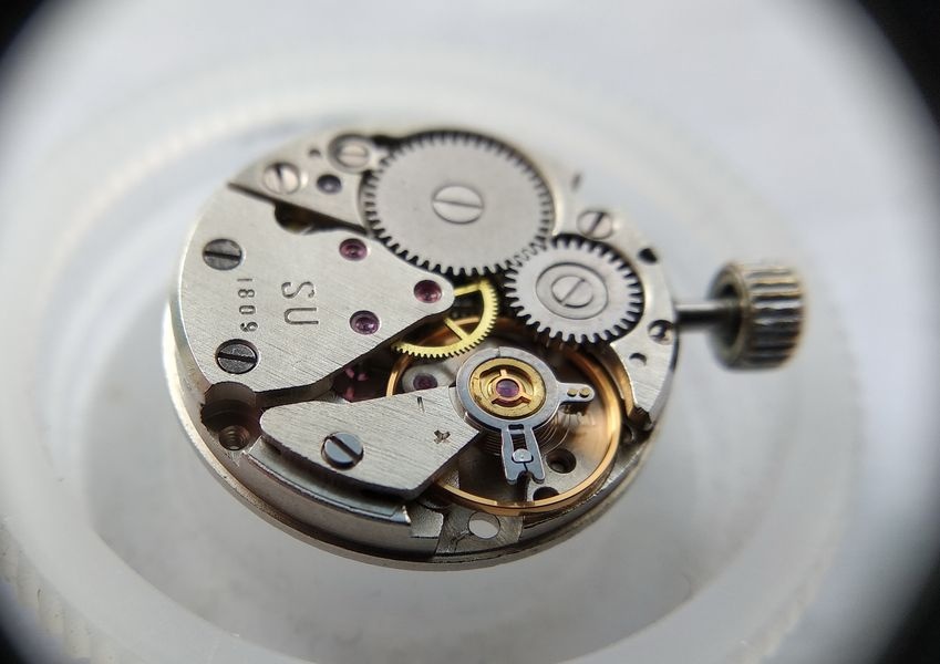 Balance and balance cock reinstalled in the Luch 1809, with the movement running