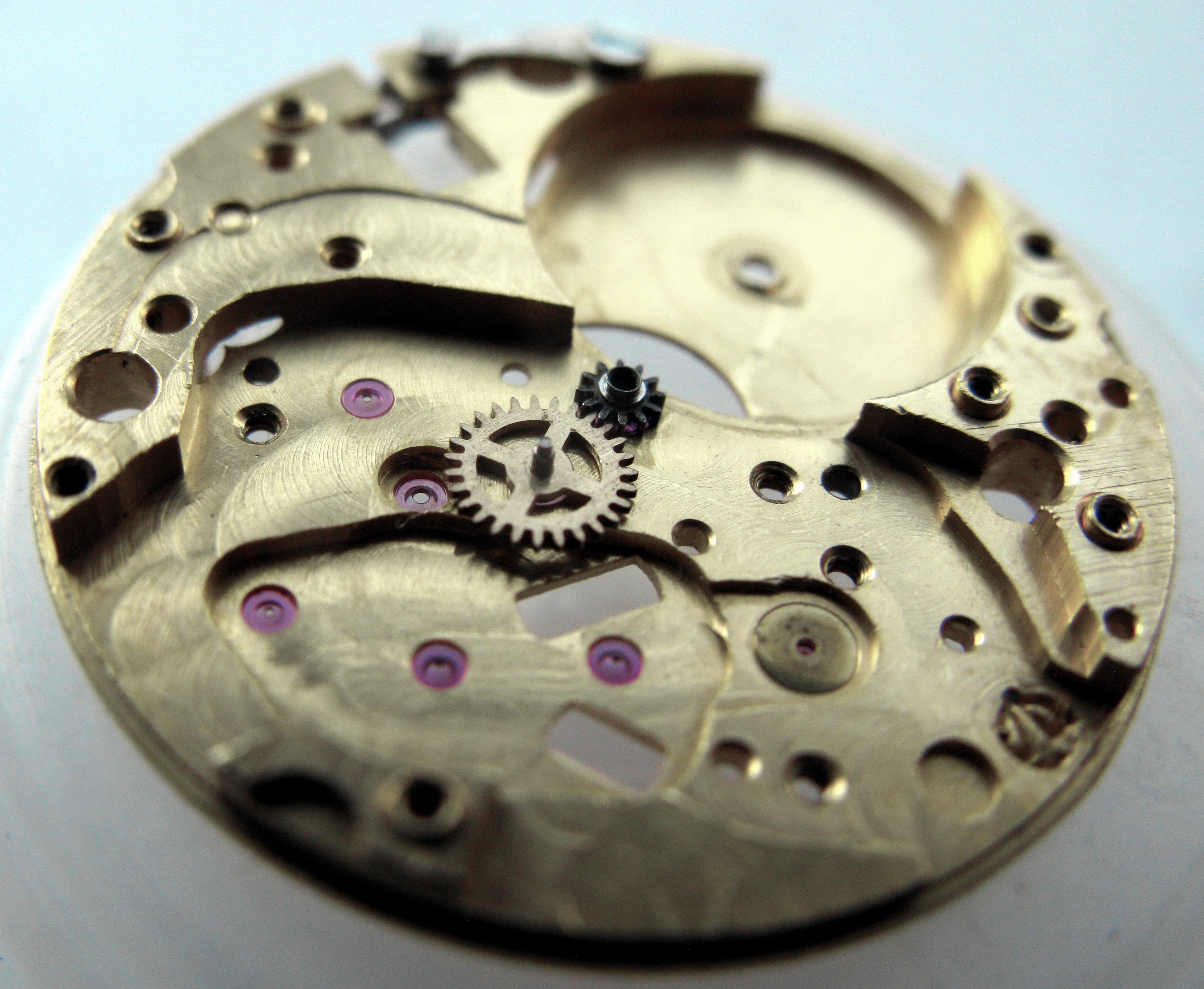 Central pinion with one of the central wheels refitted.