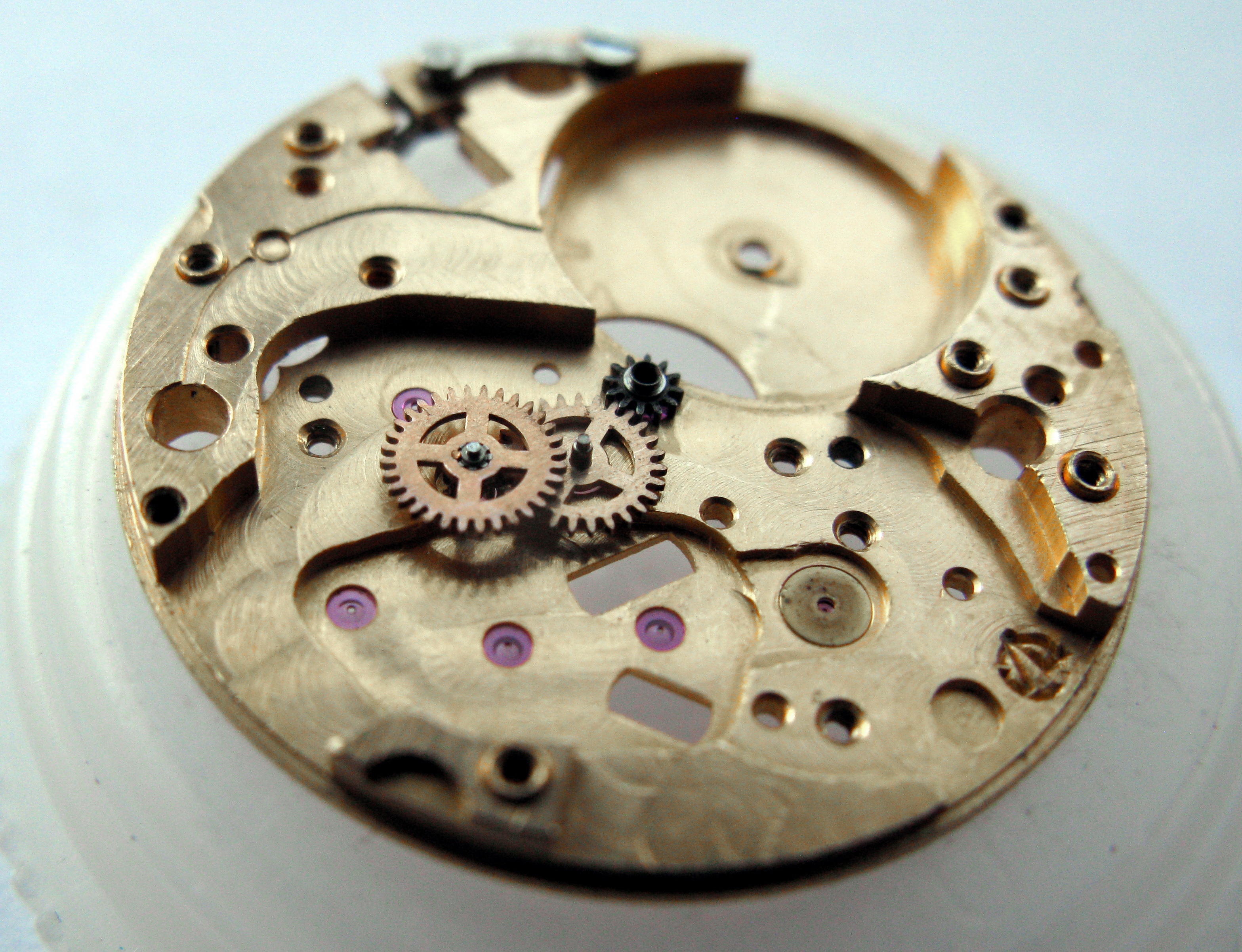 Both split center wheels installed and meshed at the center of the plate.