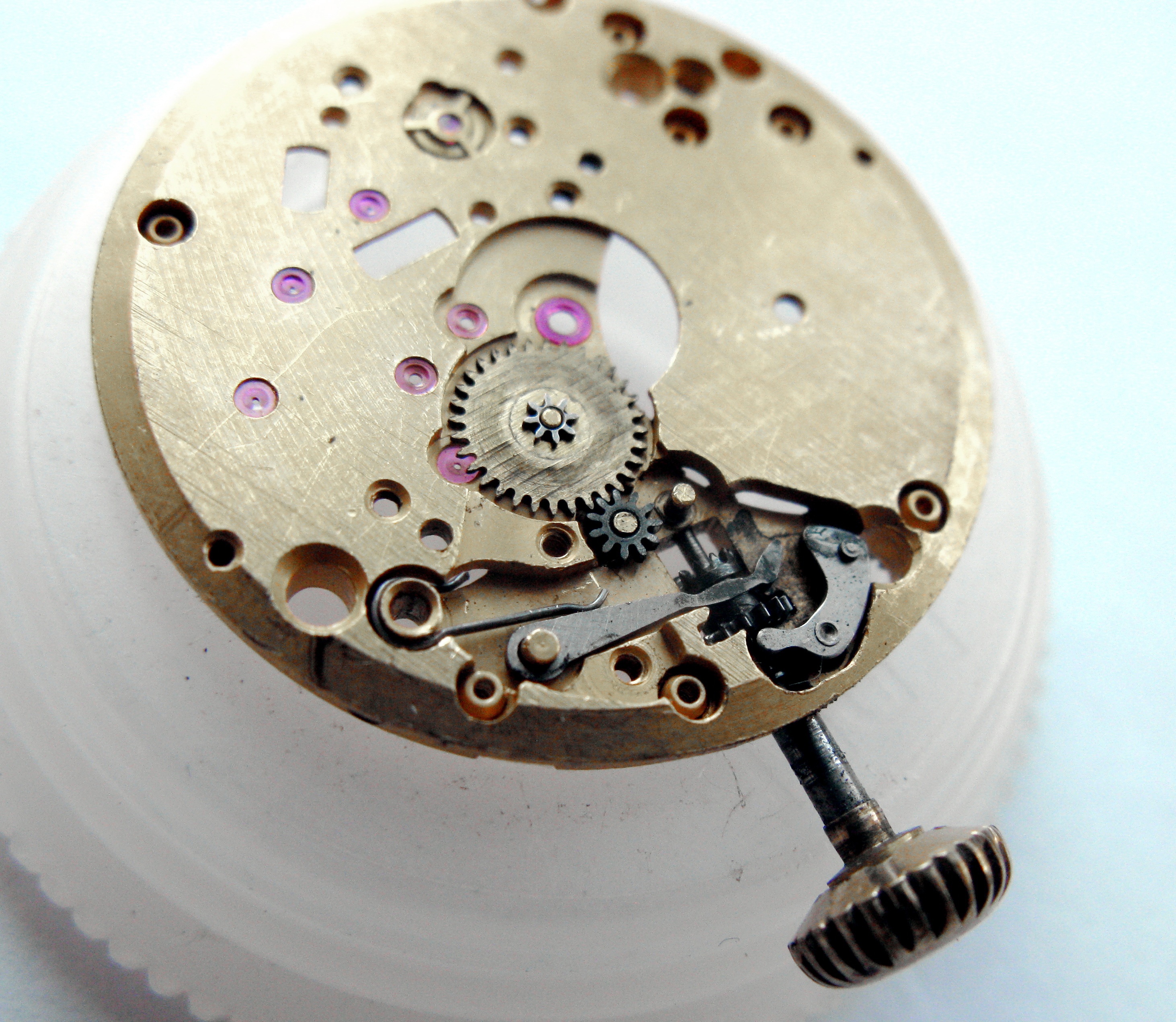 Further view of the dismantled keyless and motion-work components on the mainplate.