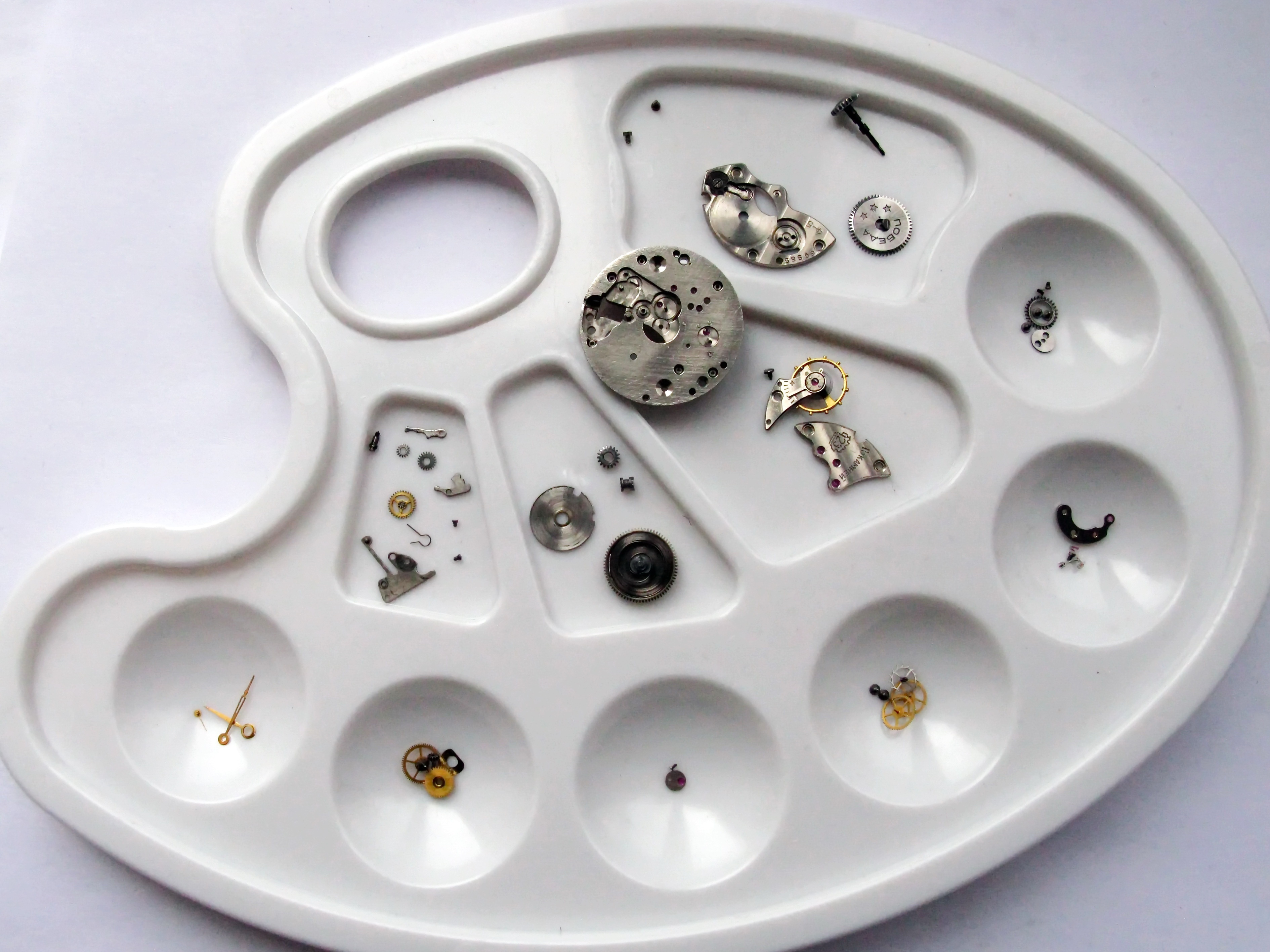 The fully stripped movement, all parts removed from the mainplate.