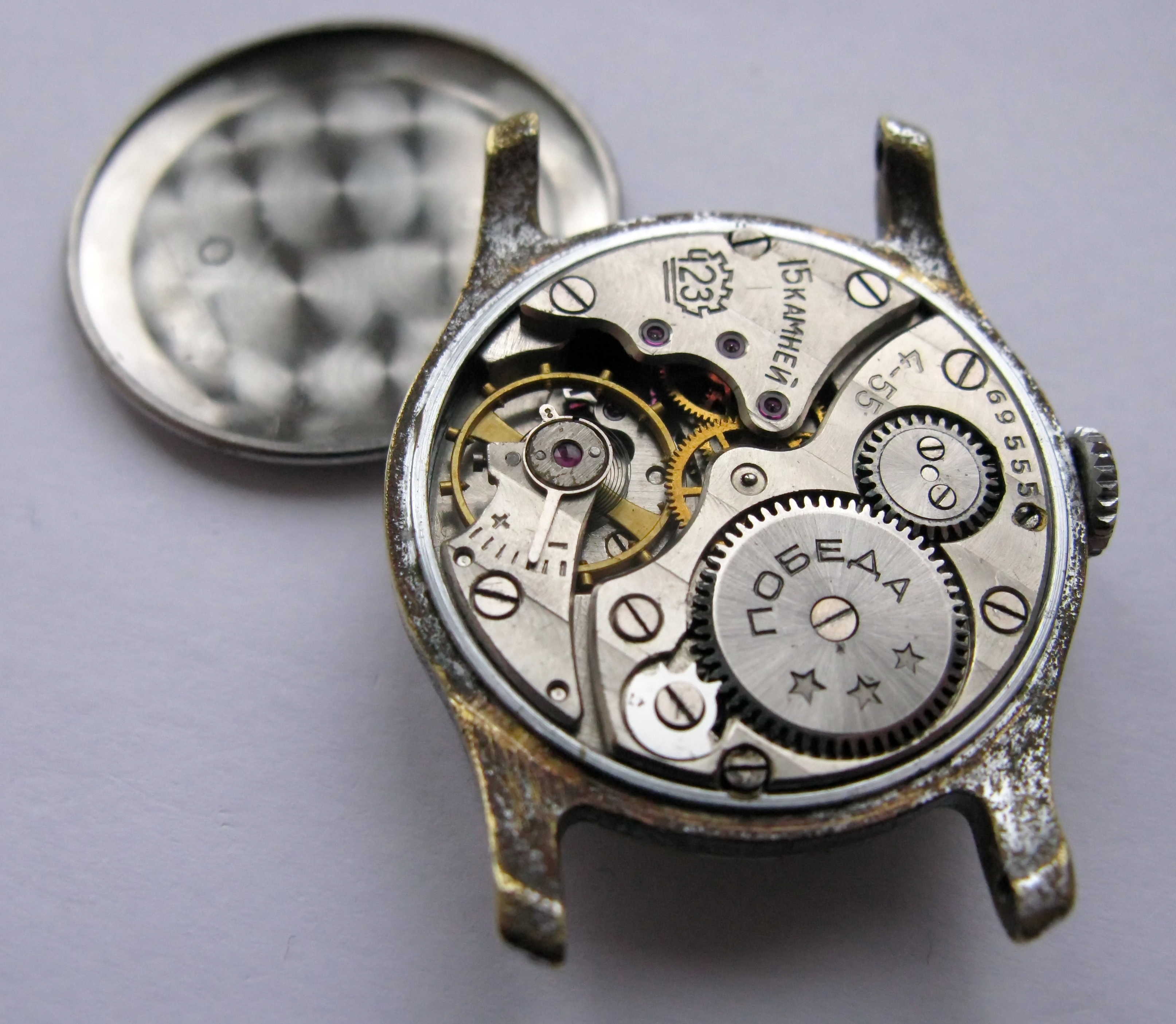 The caseback opened to reveal the movement.