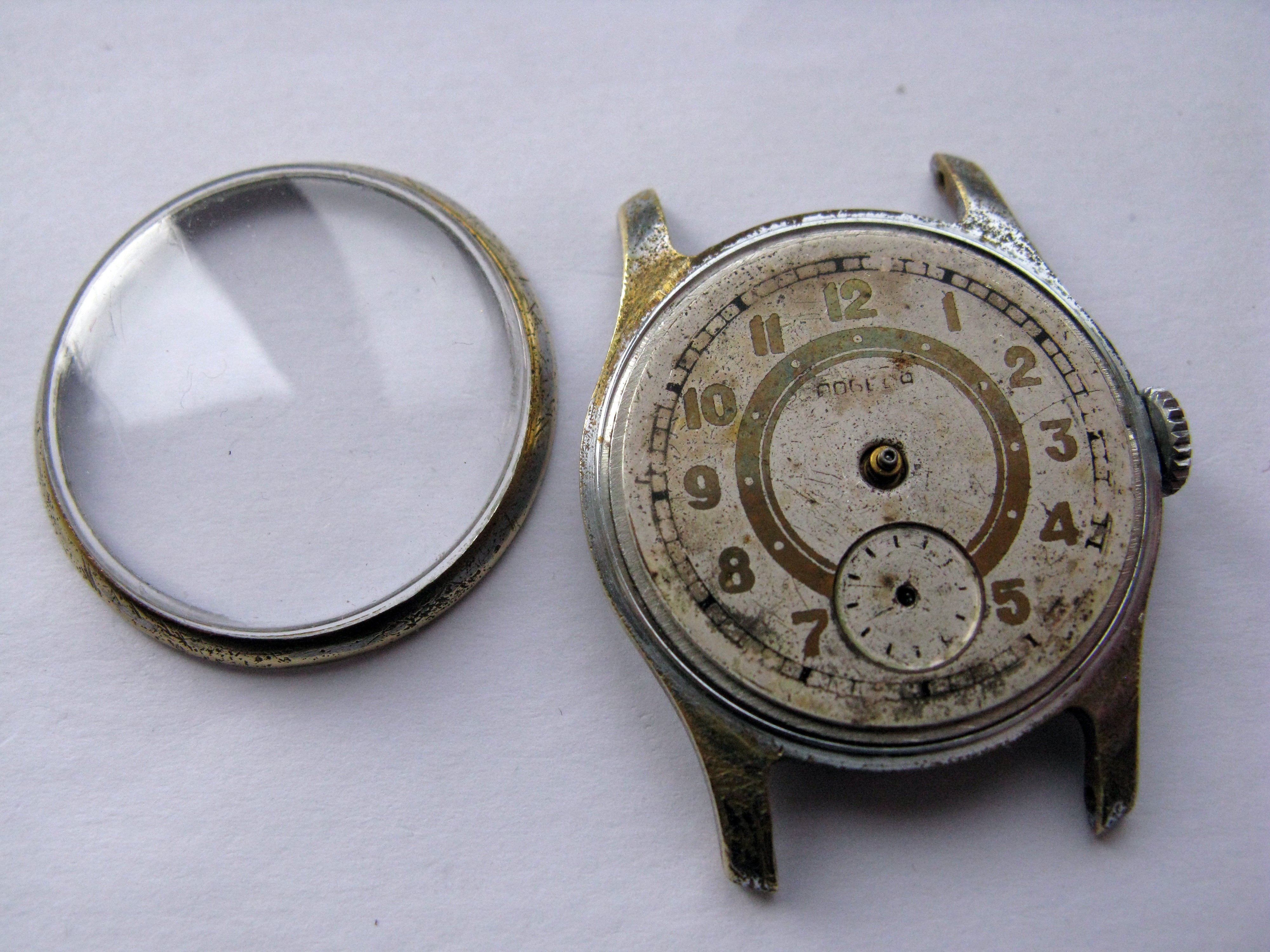 The hands being pulled from the dial.