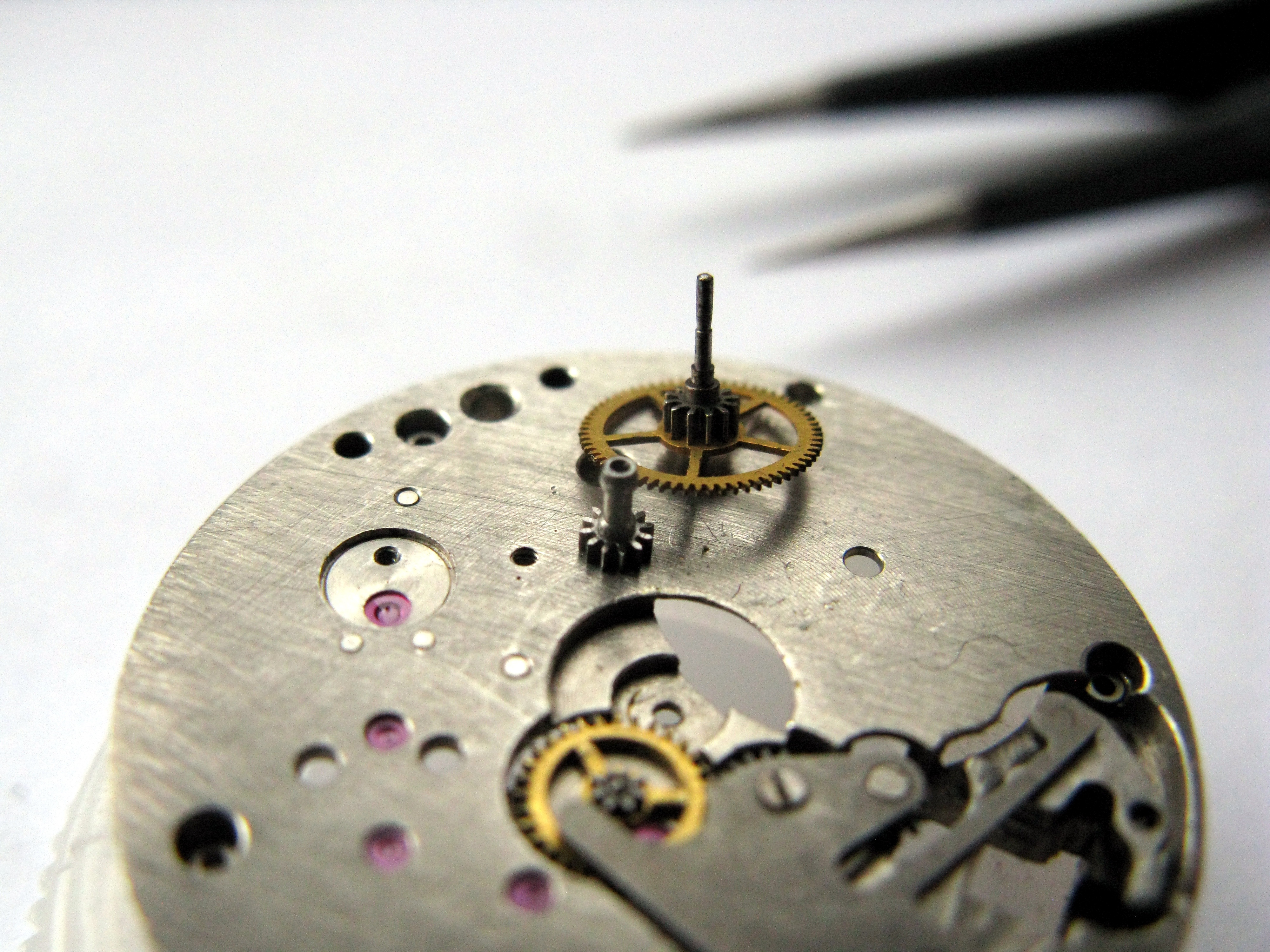 The minute pinion and center wheel removed.