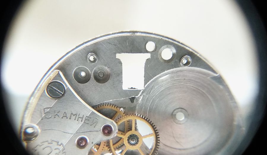 The T-shaped recess machined into the main plate that houses the clutch members