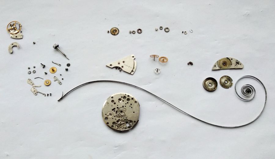 The nearly stripped main plate with only the seized centre wheel remaining