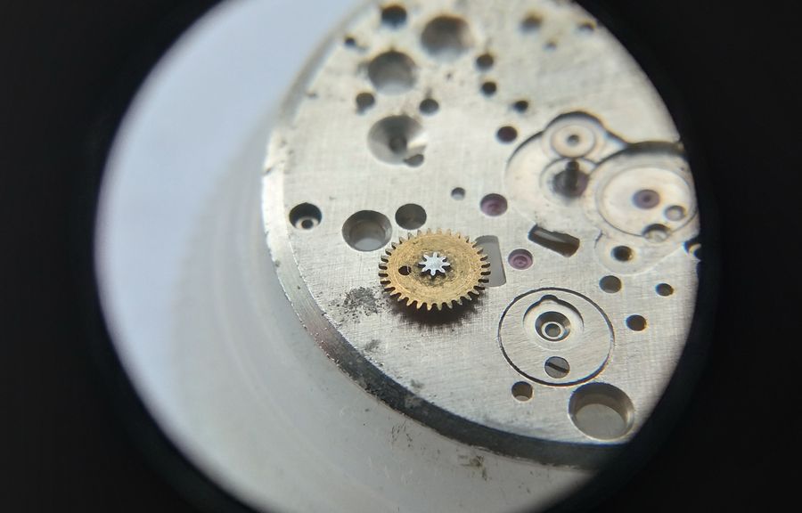 The minute wheel shown from the pinion side