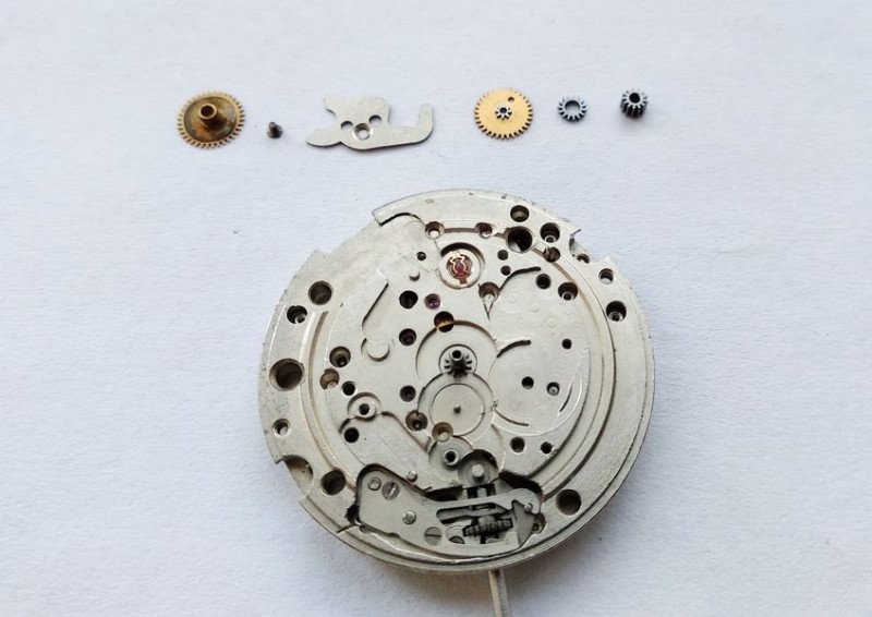 Wheel train systematic disassembly in progress