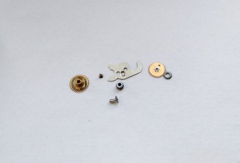 Keyless works components laid out for inspection