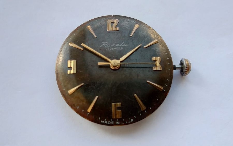 Raketa Baltika movement viewed from the dial side showing the pronounced domed profile of the main plate and case architecture