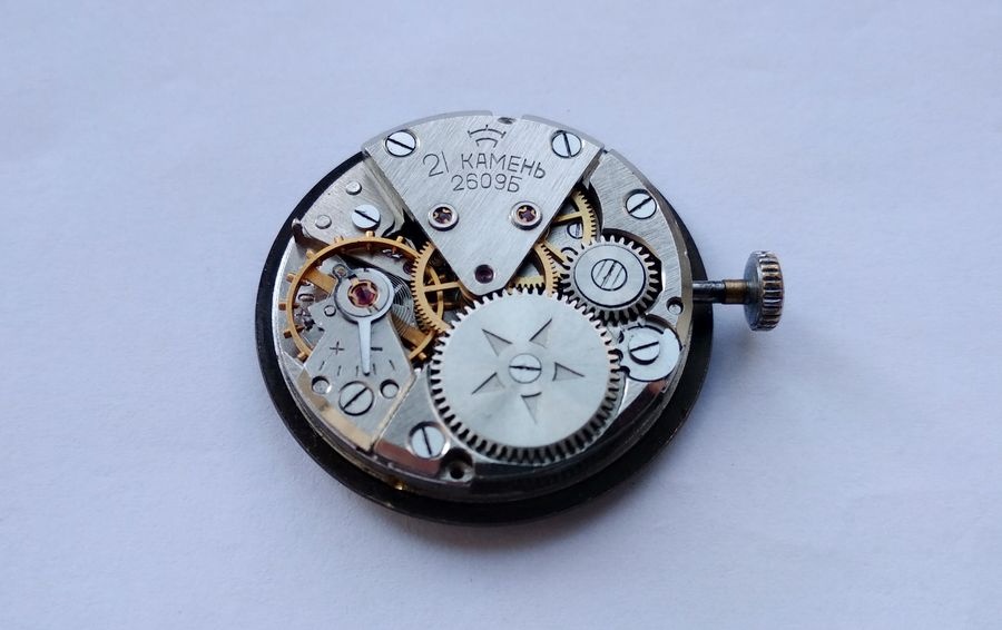 Raketa 2609B movement viewed from the movement side showing the sector-shaped cantilevered gear train bridge mounted on one side of the main plate