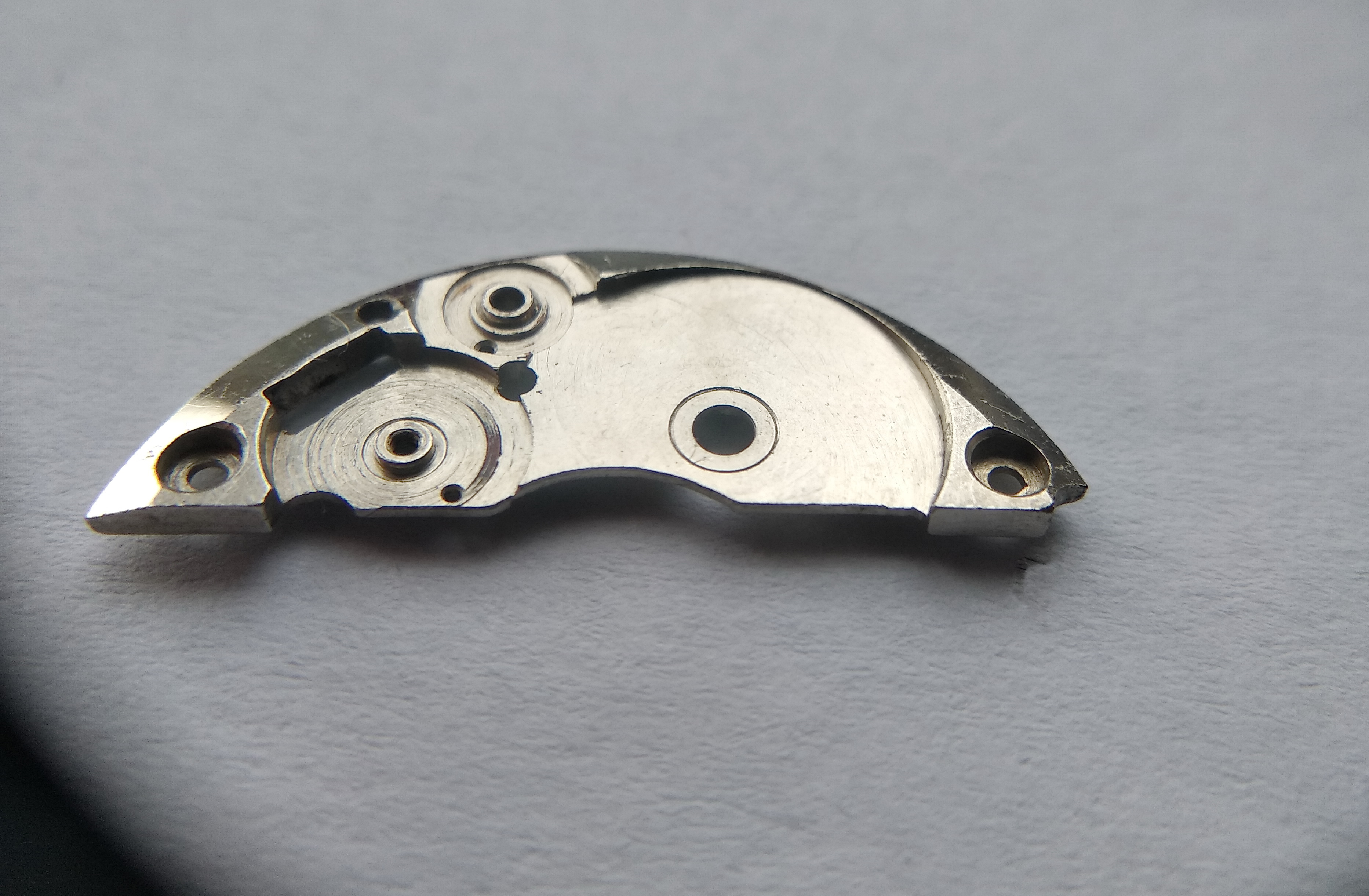 Cleaned barrel bridge showing the hard-alloy insert for the arbor