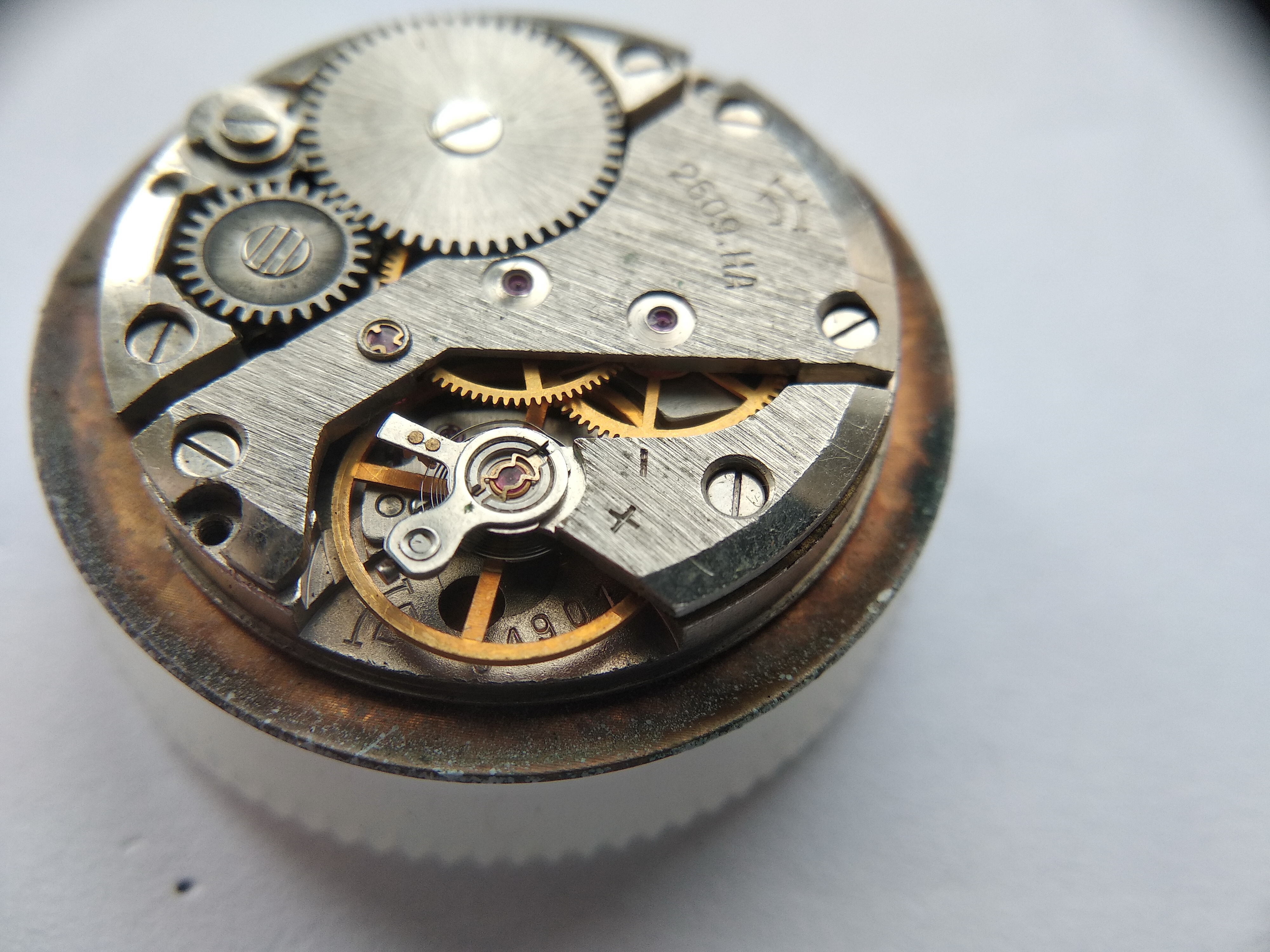 Full view of the 2609.NA movement out of its case, dial removed, before disassembly