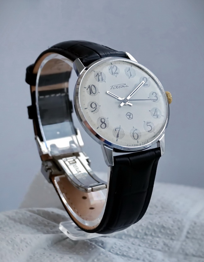 Reassembled Raketa watch after cleaning, with restored dial and hands fitted