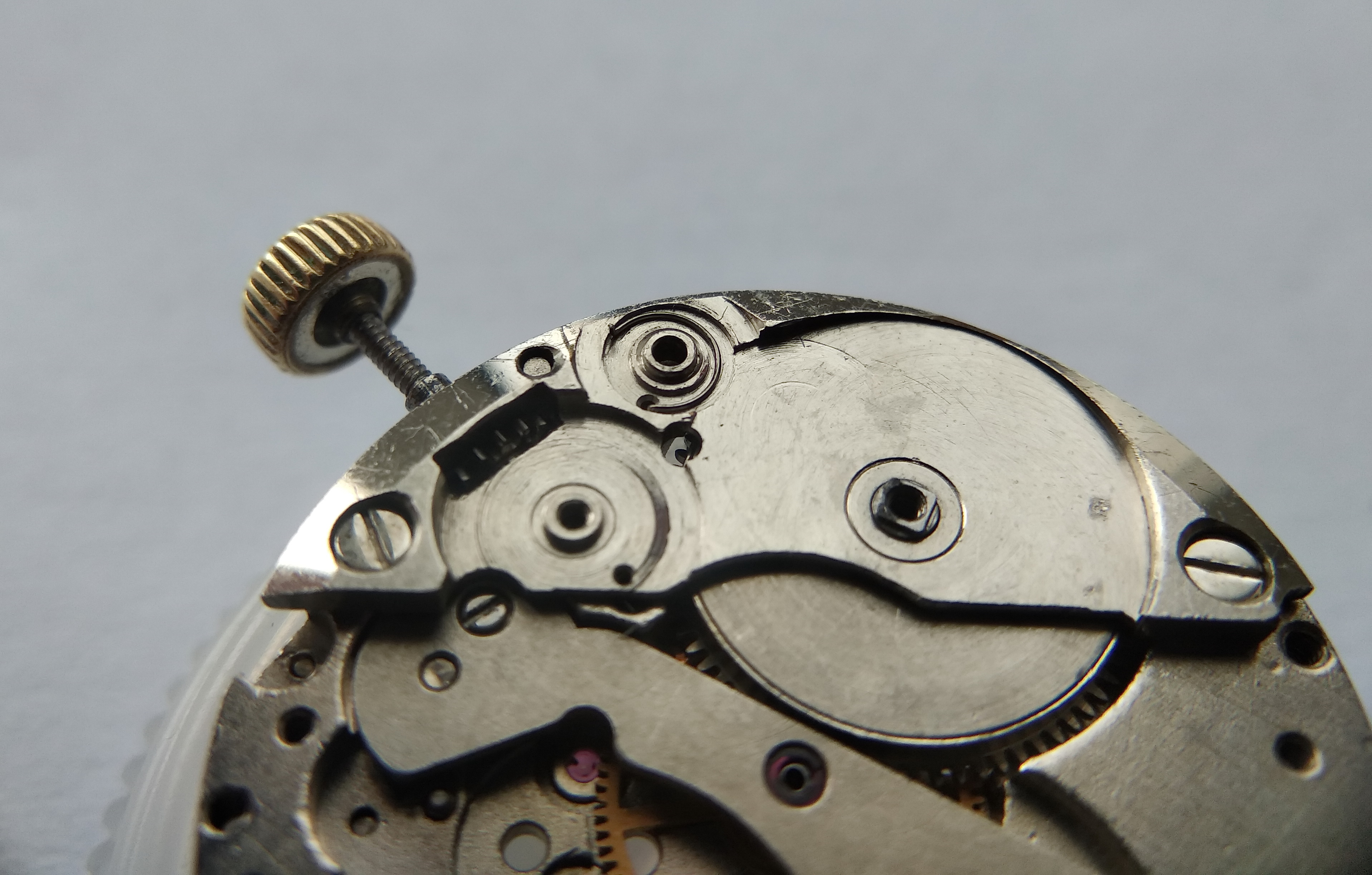 Click spring being installed at the barrel ratchet