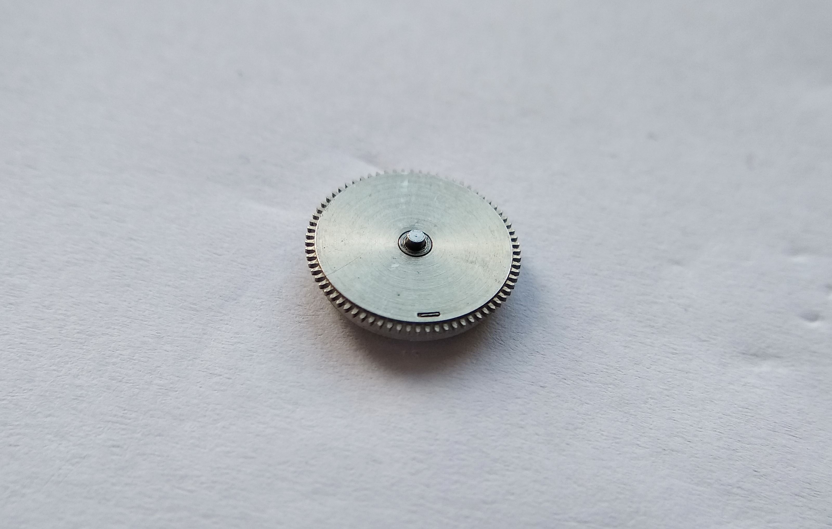 The fully assembled and closed mainspring barrel