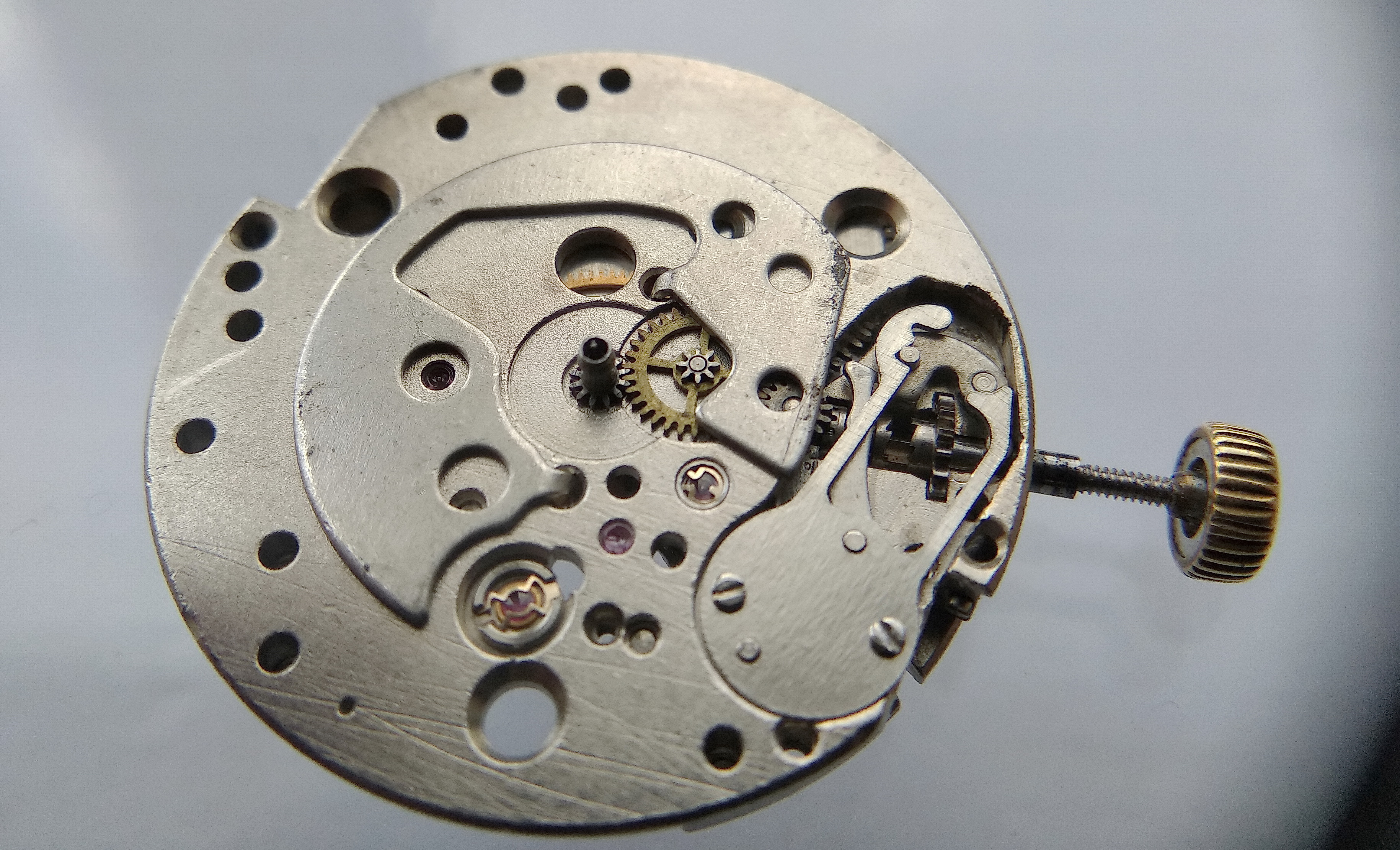 Cover plate fitted over the reassembled motion works