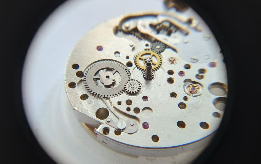 The assembled calendar wheel train on the plate, command wheel and drive wheel in place