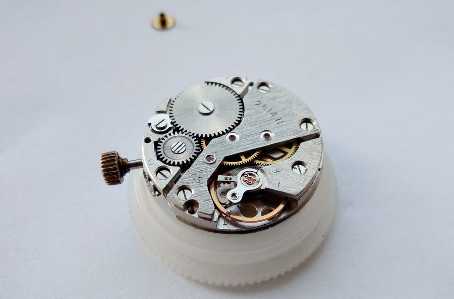 The completed balance side of the movement on a holder, marked 2614.Н, fully assembled