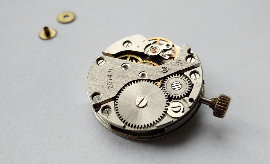 Balance side of the assembled movement with the balance, bridges and ratchet wheel in place