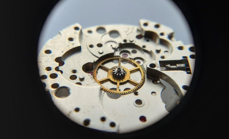 The center wheel being set into its jewel on the mainplate