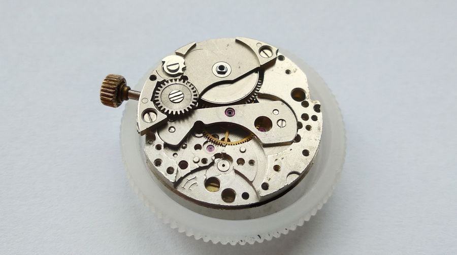 The partially stripped fast side of the movement with a few components still in place