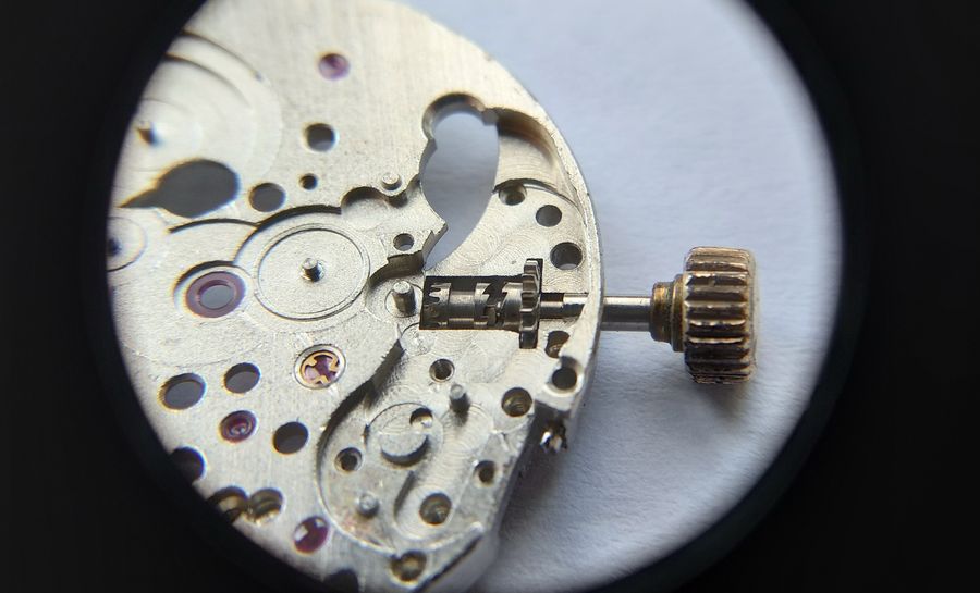 The sliding pinion and castle clutch being assembled onto the winding stem