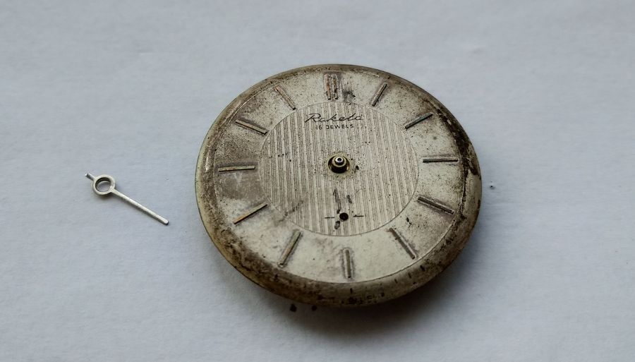 Dial removed showing oxidation