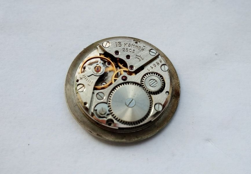 Movement removed from case