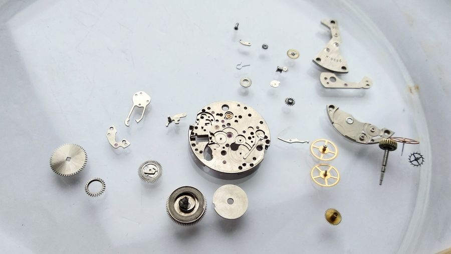 Cleaned movement components laid out