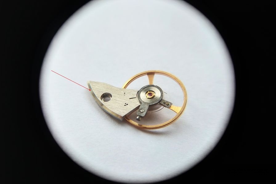 Early balance assembly with yellow wheel and finished components
