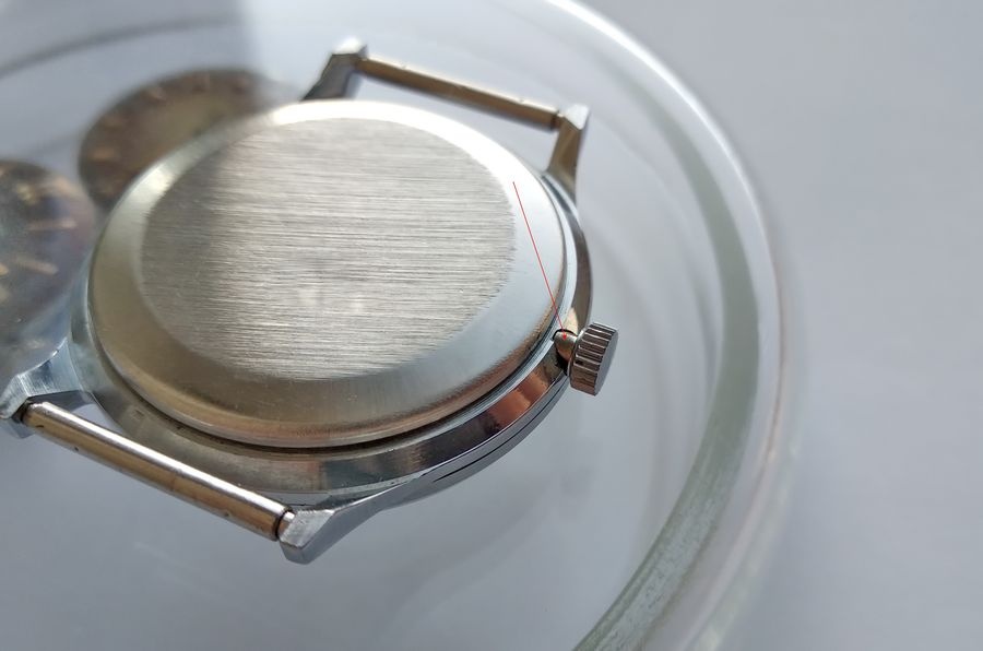 Crown detail showing dust protection sleeve system