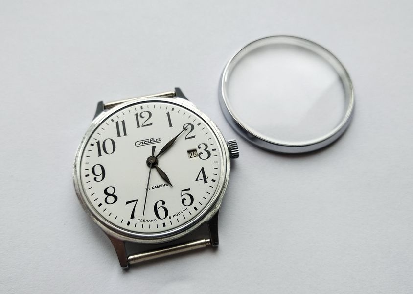Domed crystal removed from case