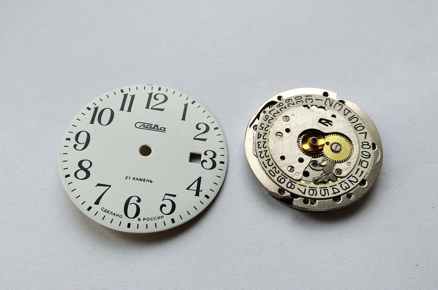 Pristine white dial stored in protective container