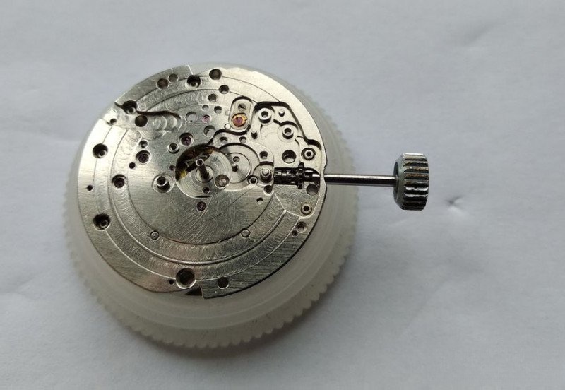 Keyless works clutch assembly and stem installation