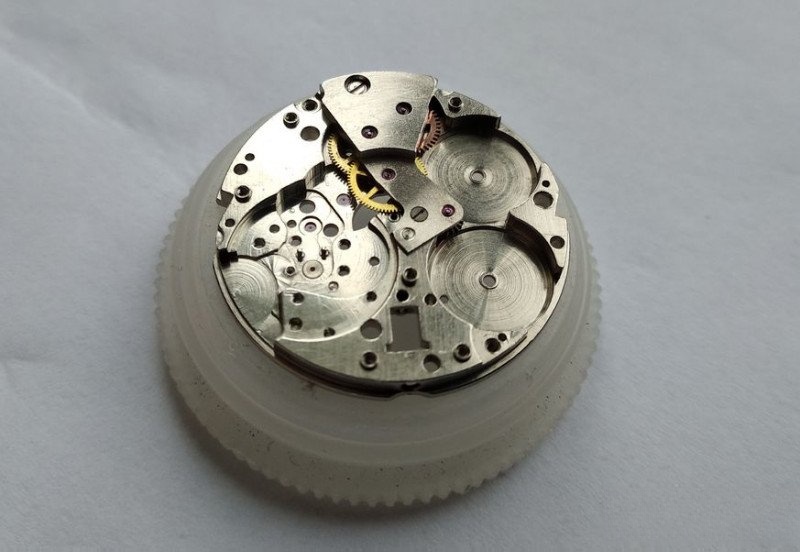 Gear train bridge installed and jewels oiled