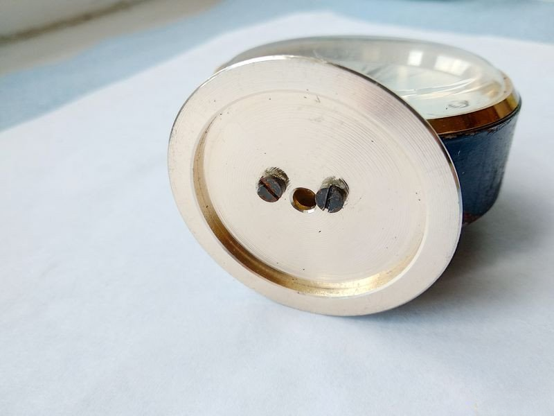 Close-up of clock mechanism damage